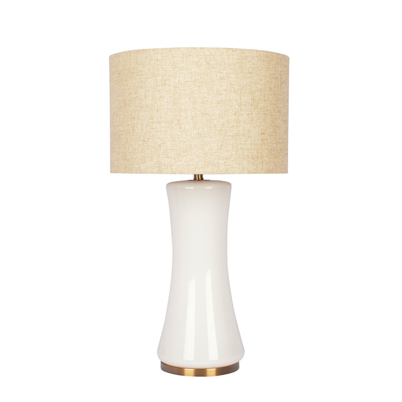 Beige fabric drum shade table lamp with white ceramic base and gold trim