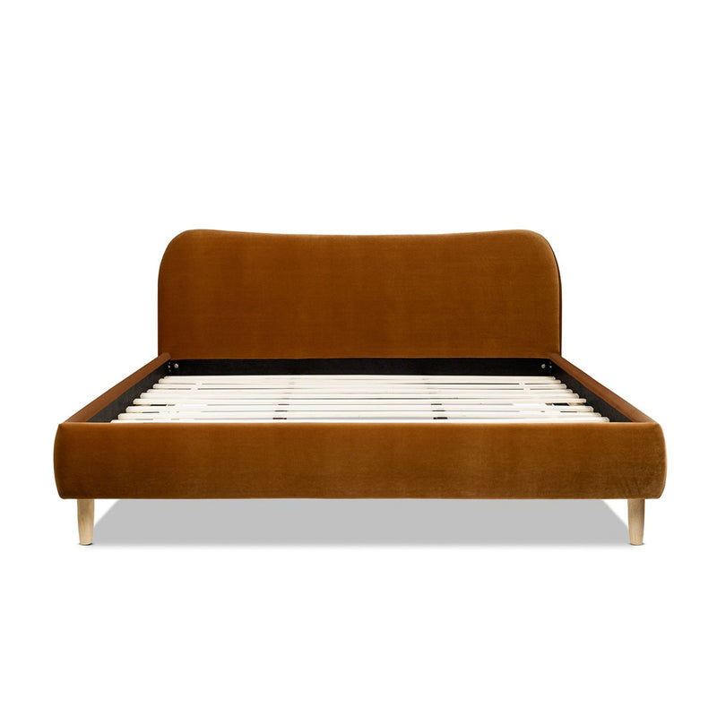 Orange upholstered platform bed with curved headboard and slatted base, front view