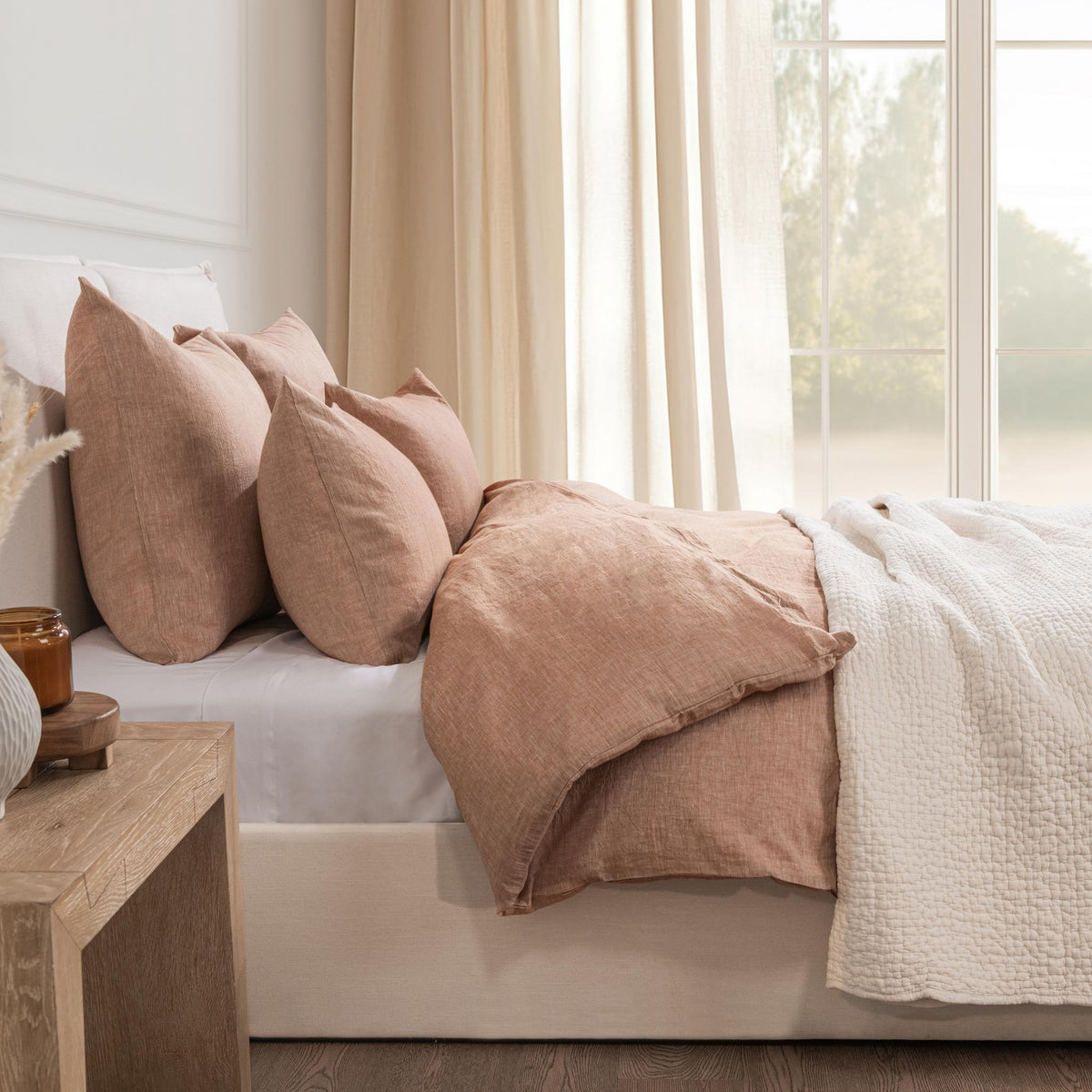 Clay linen-cashmere duvet and pillow covers on a bed