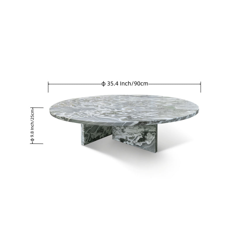 Round gray marble coffee table with veined top and sculpted stone legs