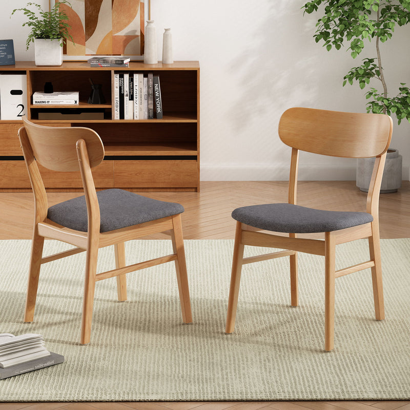 Set of 2 dining chairs with dark gray seat cushions and curved light wood backs