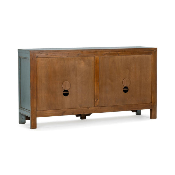Wood cabinet with two panel doors and oval cutout pulls, standing on short legs