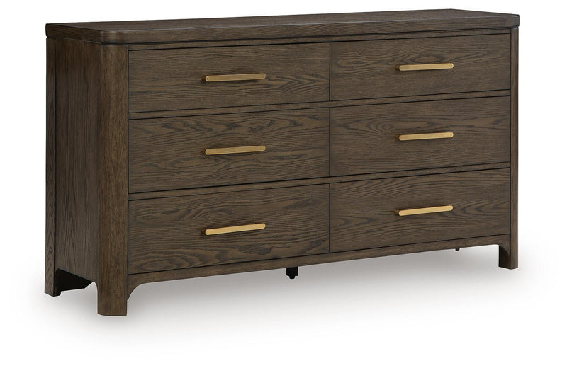 Dark brown wood dresser with six drawers and gold bar pulls