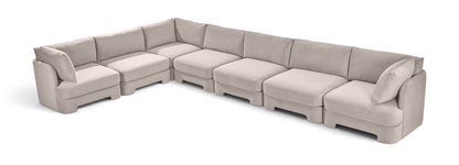 Velvet sectional sofa in light beige with square arms and plush seat cushions
