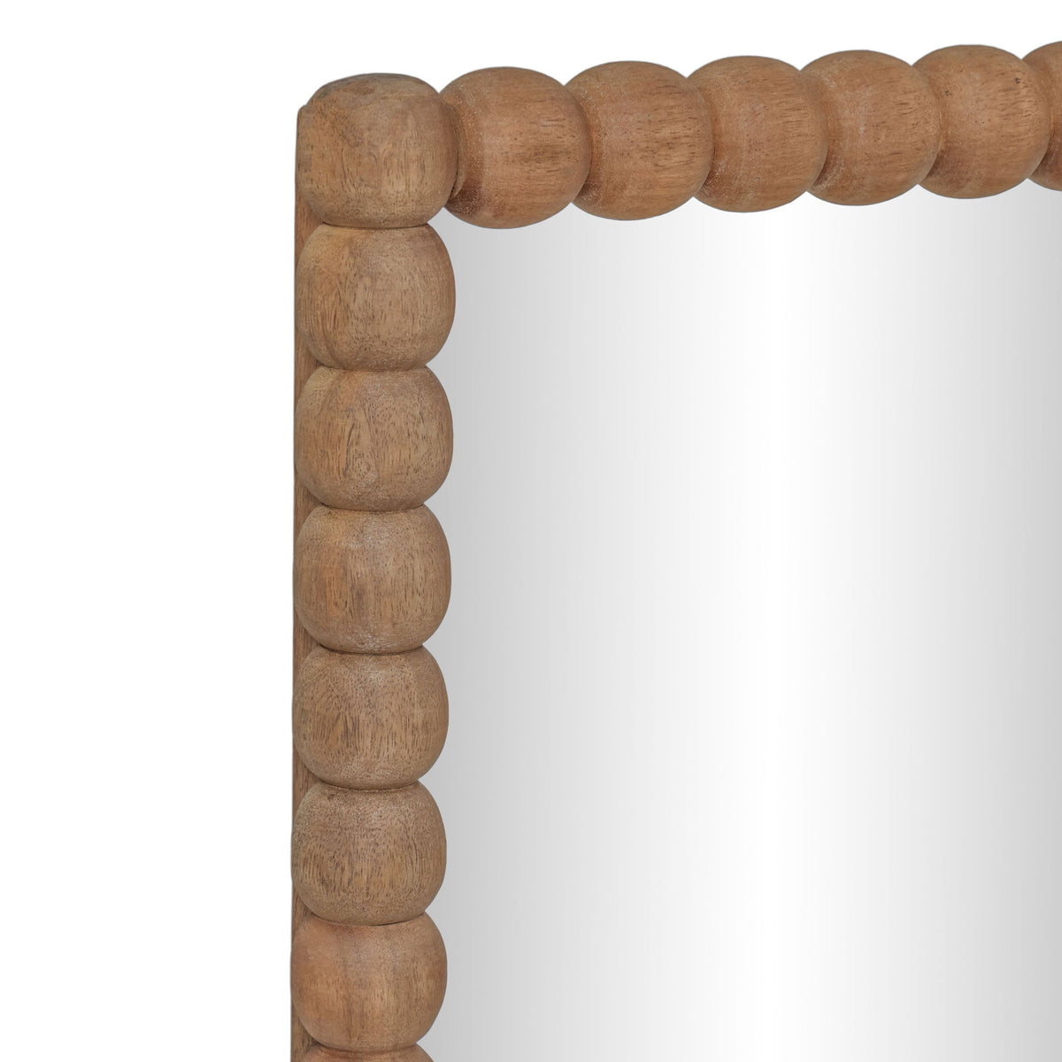 Close-up of natural wood rectangular mirror corner with carved rounded bead trim frame.