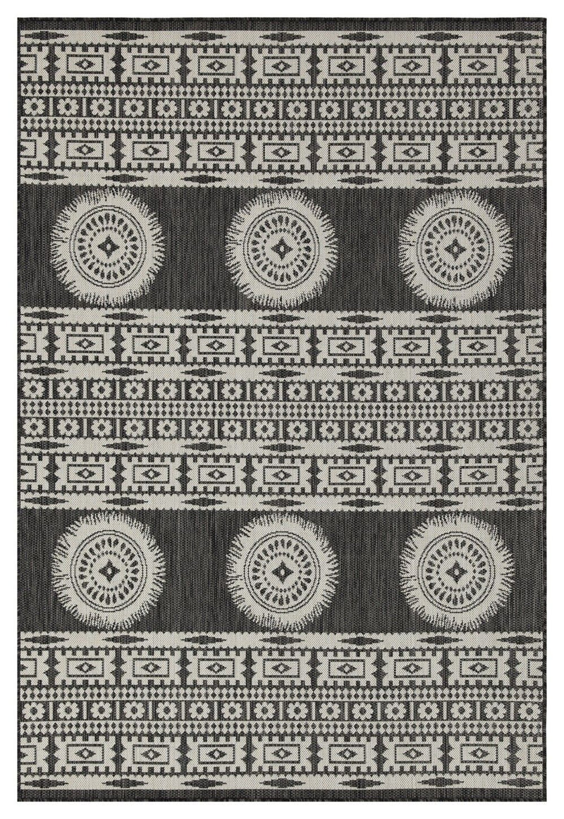 Dark gray polypropylene area rug with white tribal stripes and medallion circles