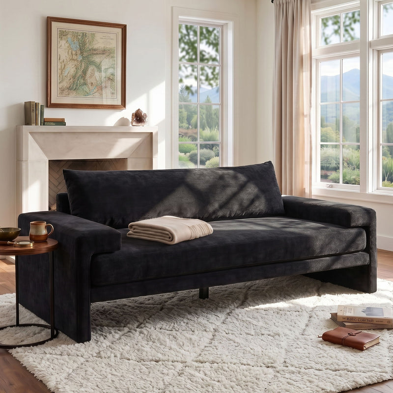 Upholstered 3-seater sofa with wide arms, dark fabric, large back cushion
