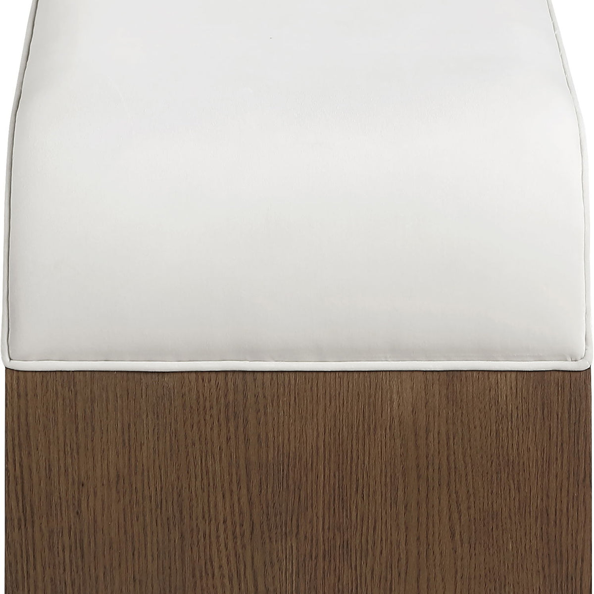 White velvet upholstered bench with dark wood base and stitched seat edge