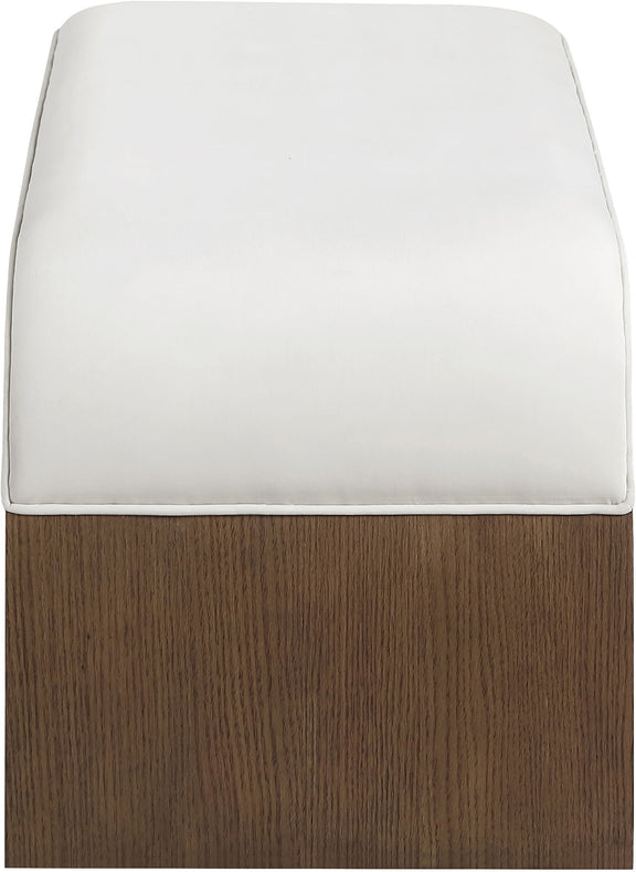 White velvet upholstered bench with dark wood base and stitched seat edge