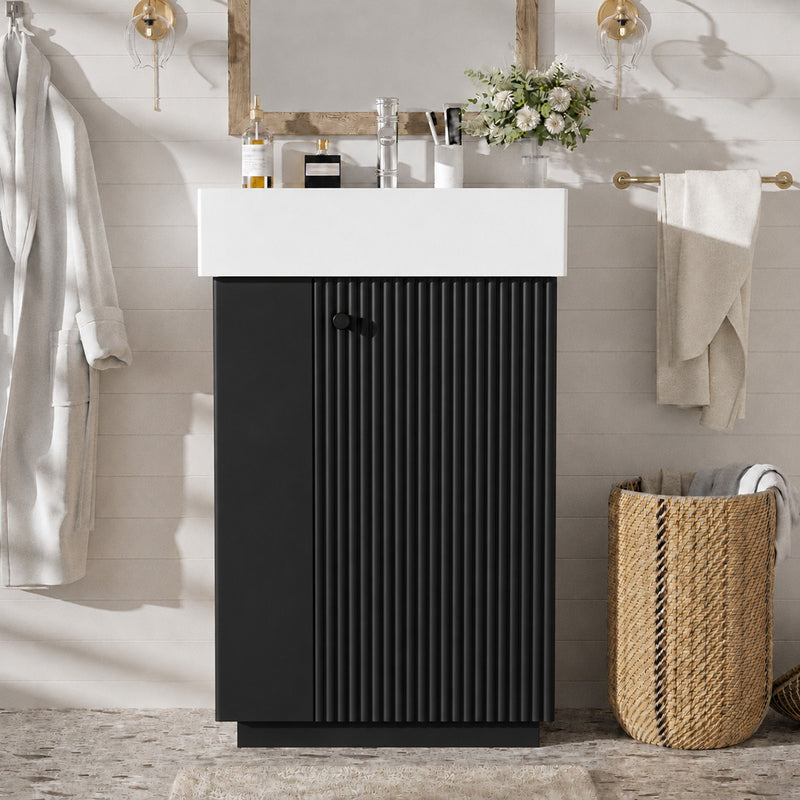 Freestanding bathroom vanity with sink, black ribbed cabinet doors with central handle