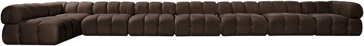 Dark brown velvet L-shaped sectional sofa with tufted cushions and rounded arms.