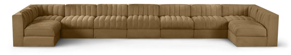 Light brown velvet modular sectional sofa with tufted cushions and curved armrests