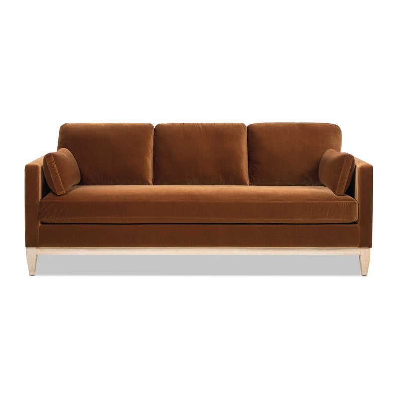 Modern farmhouse sofa in brown with three back cushions and wooden base