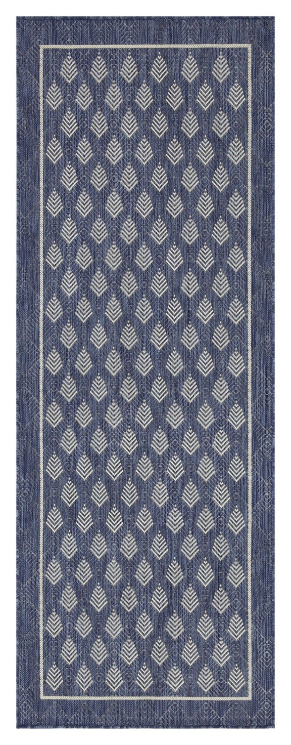 Blue indoor/outdoor area rug with repeating diamond pattern and dark border