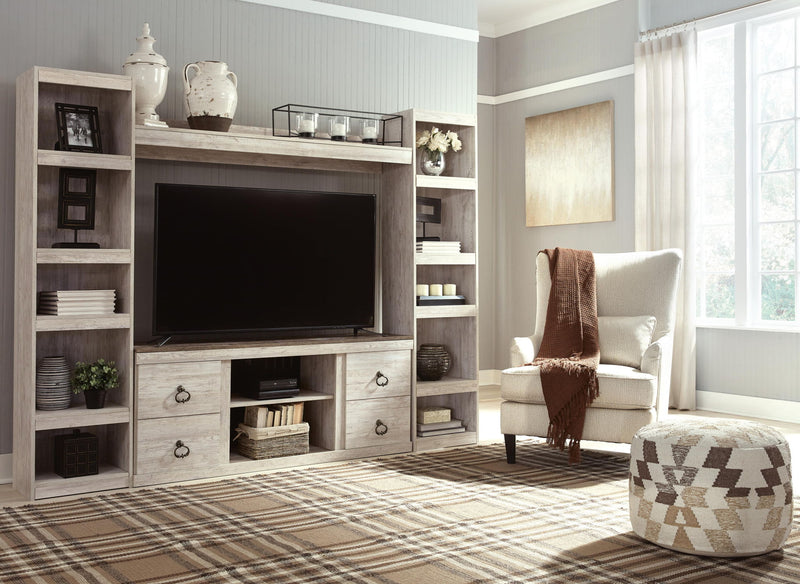 Whitewash entertainment center with TV opening, drawers, and side bookcase shelves
