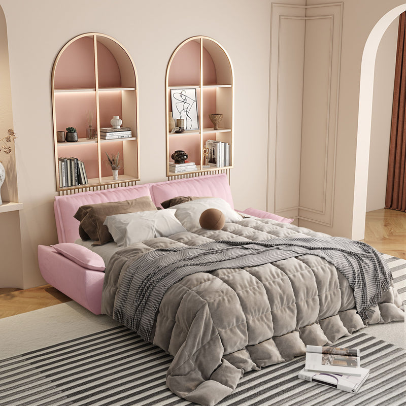 Pink sofa bed with pull-out mattress topped with gray and white bedding