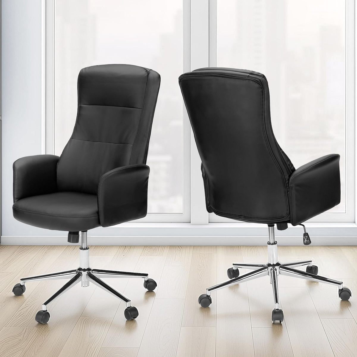 Black office chair pair with padded high backs, armrests, and rolling swivel bases