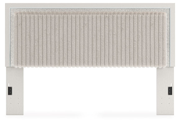 Upholstered panel headboard with white ribbed fabric and light frame, full front view