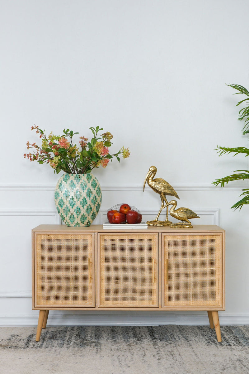 Three-door wooden TV cabinet with woven panels and tapered legs
