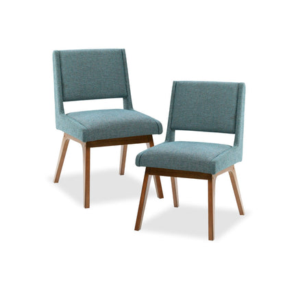 Pair of light blue upholstered dining chairs with open backs and tapered wooden legs
