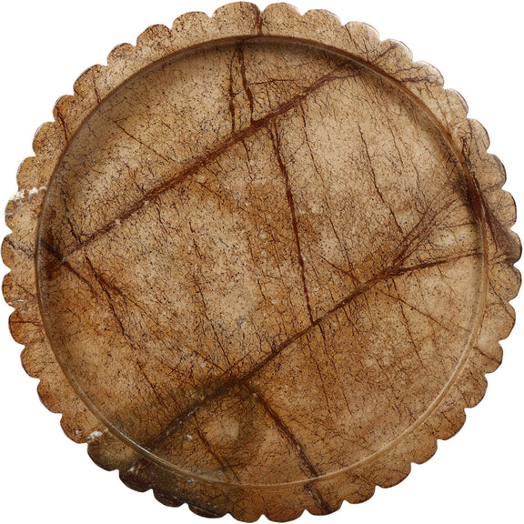 Round brown marble tray with scalloped rim and dark veining