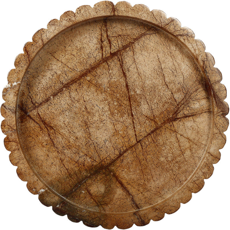 Round brown marble tray with scalloped rim and dark veining