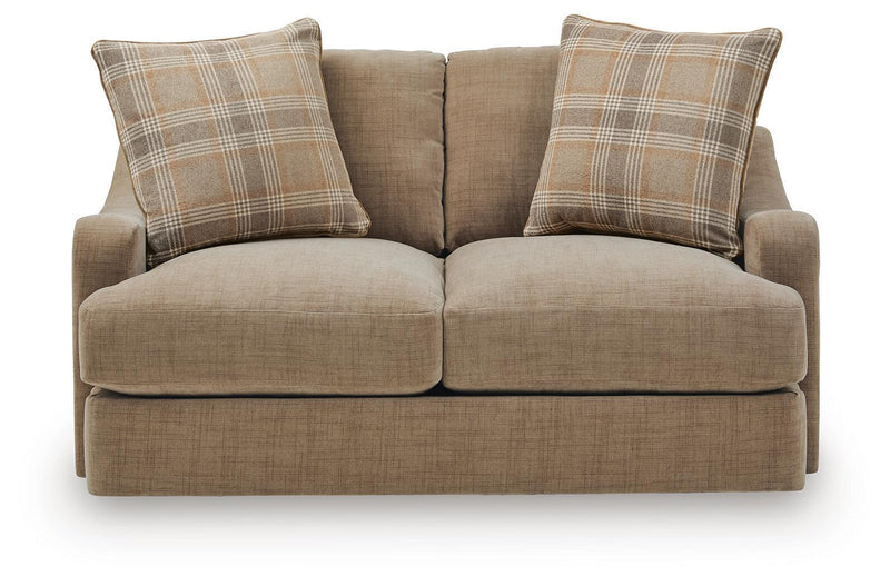 Beige upholstered loveseat with two plaid throw pillows and two deep seat cushions