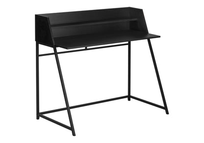 Black computer desk with two open shelves and angled black metal legs