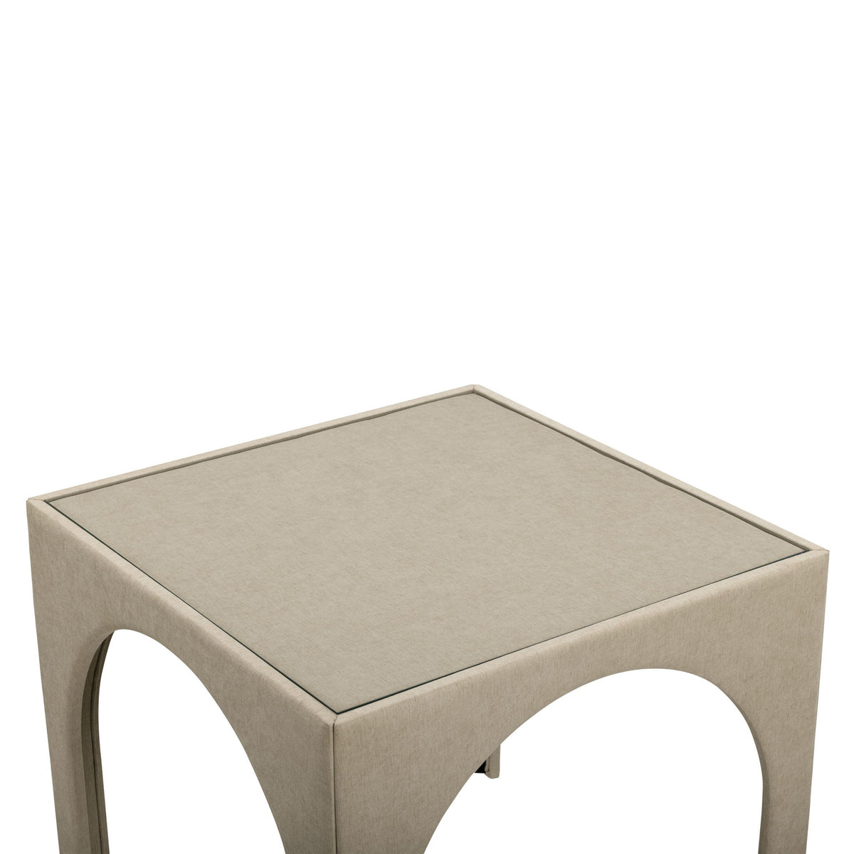 Beige upholstered game table with square top and rounded arched side openings