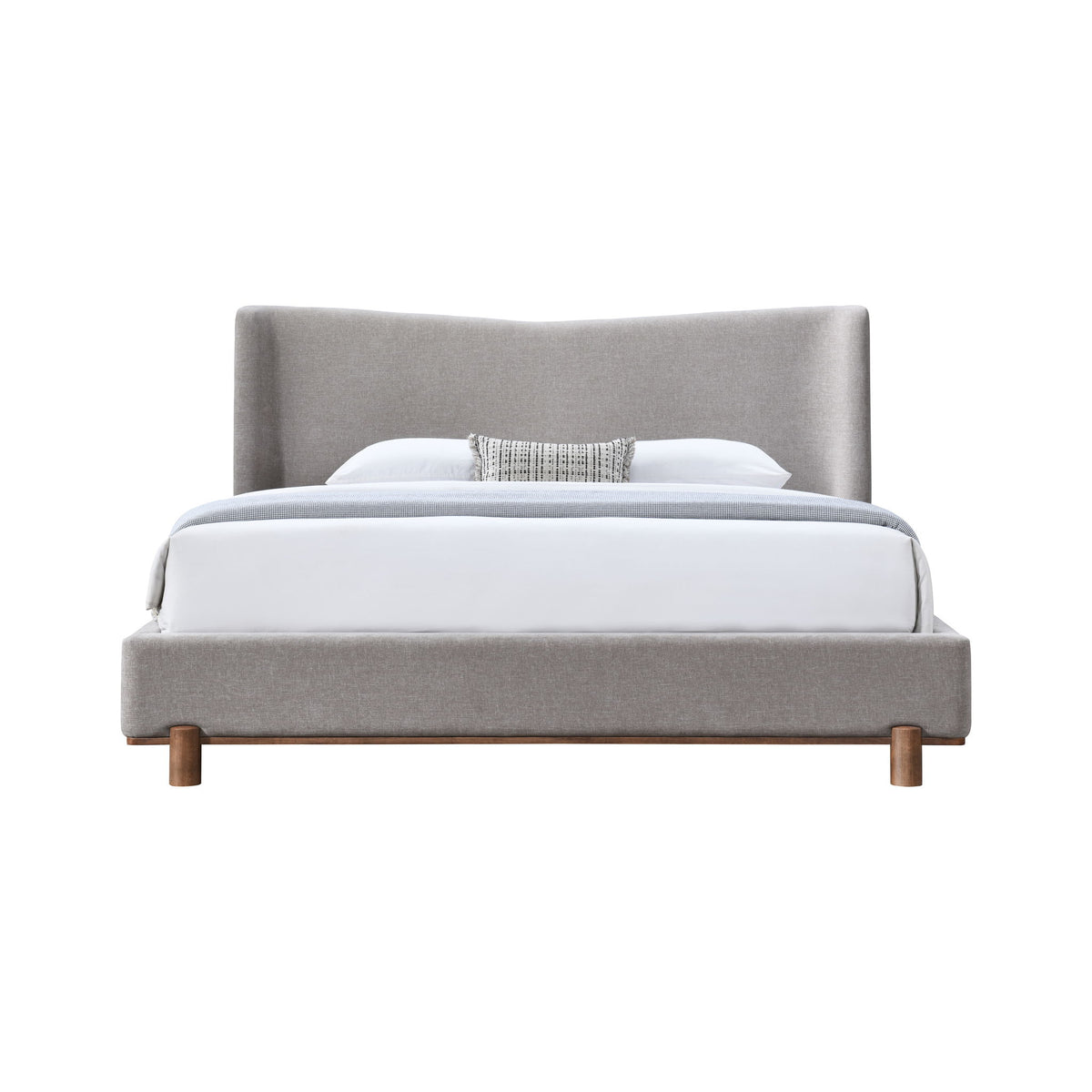Gray upholstered bed with tall headboard and white pillow, wooden legs