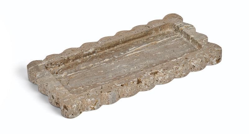 Marble tray with scalloped edge, weathered beige-brown stone surface.