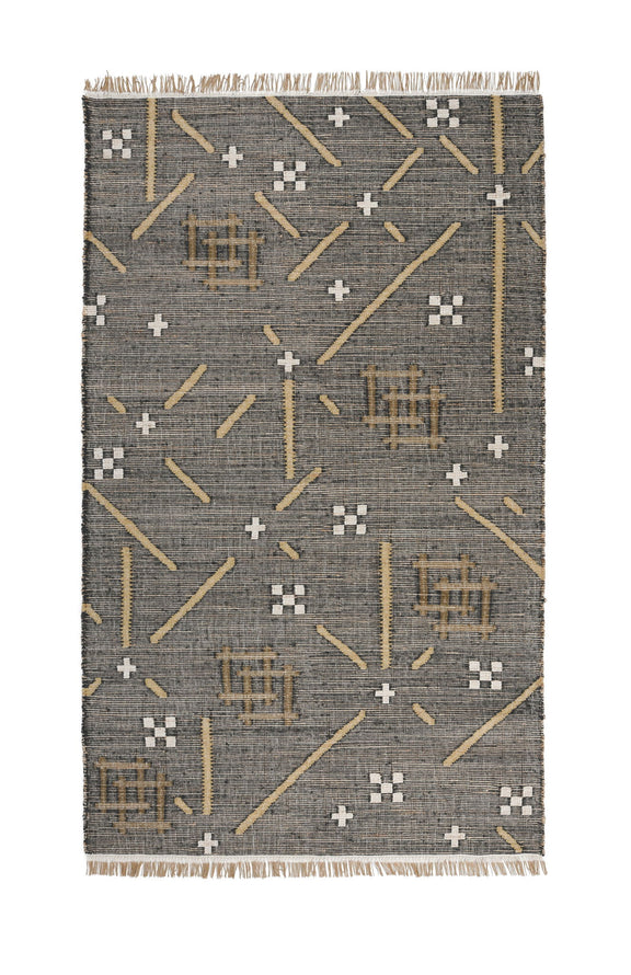 Charcoal area rug with tan and white geometric lines and plus motifs, fringed