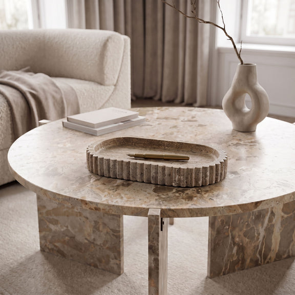 Travertine tray in dark speckled tone with scalloped edges