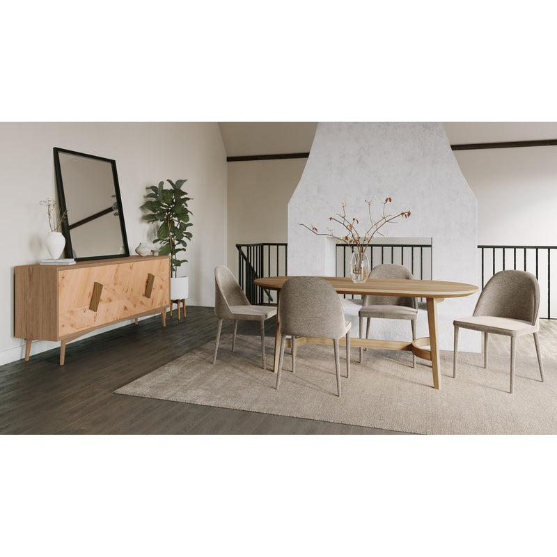 Gray dining chairs with rounded backs and seats, tapered legs in a dining setup