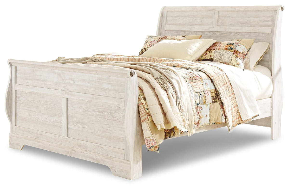 Queen sleigh bed with whitewash finish and paneled headboard and footboard