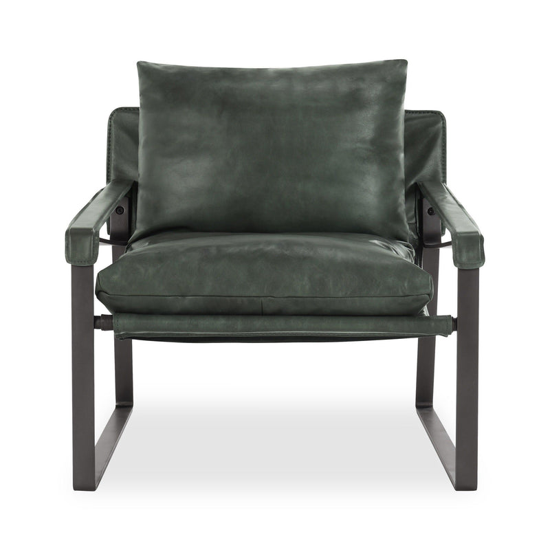 Dark green upholstered accent chair with back pillow, arms, and black metal legs