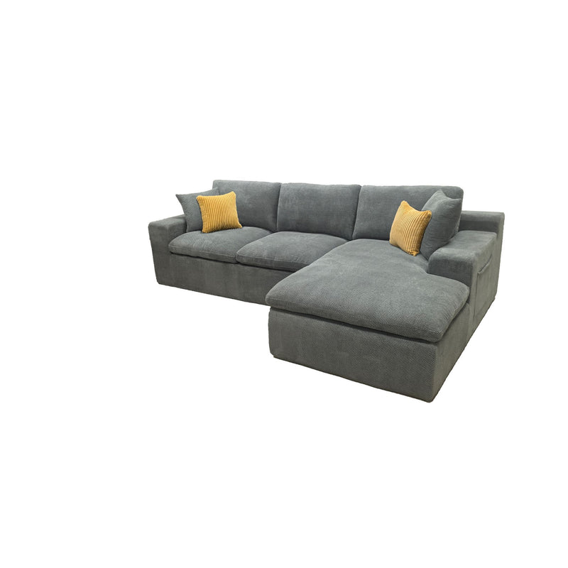 Dark gray U-shaped sectional sofa with chaise extension and two mustard throw pillows