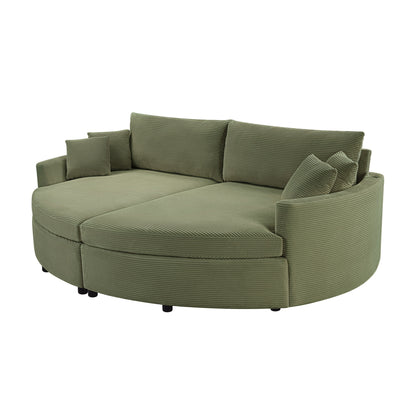 Green oversized chaise lounge sofa with rounded arms and stacked back cushions