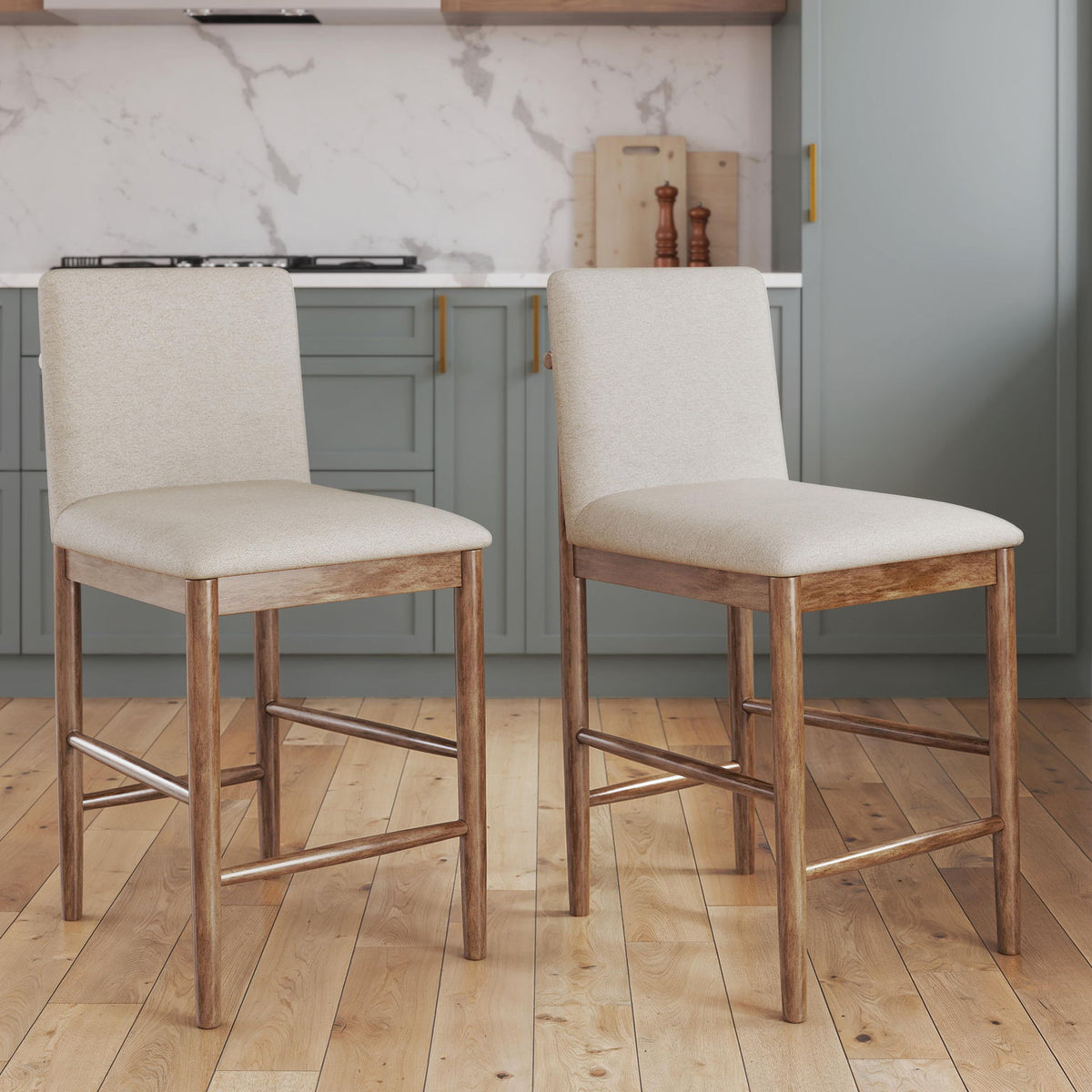 Two beige upholstered barstools with light brown wooden legs and built-in footrests