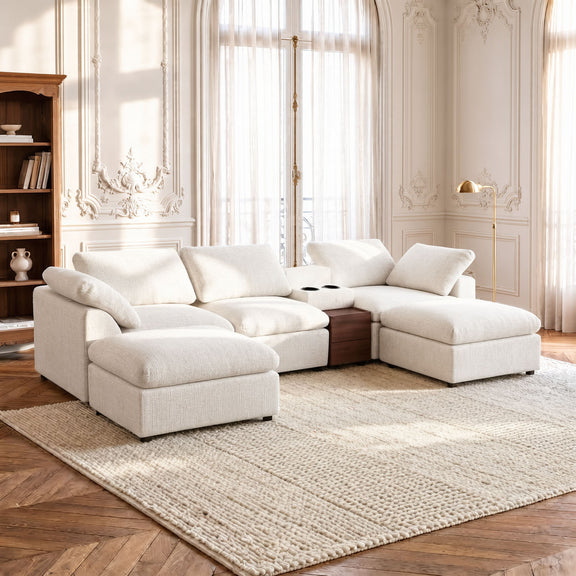 Cream modular sectional sofa with chaise ottomans and storage console