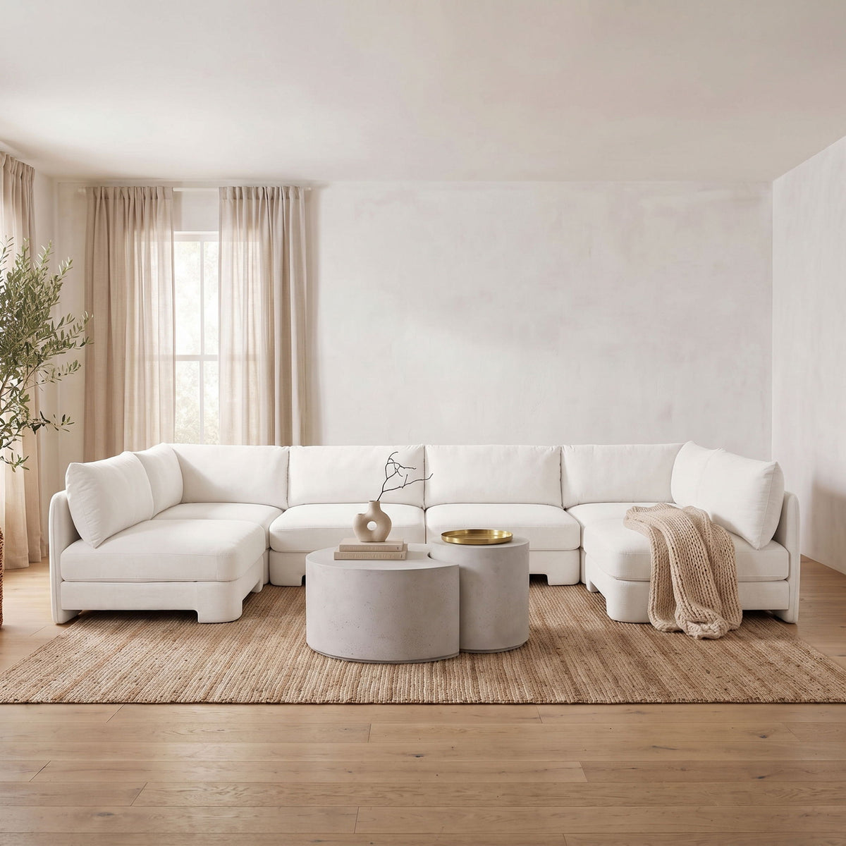 U-shaped armless sectional sofa, light gray velvet with rounded corner chaise