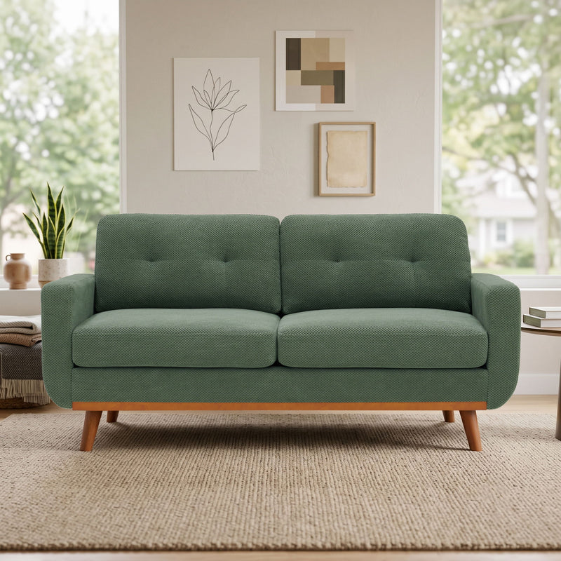 Two-seat sofa in green woven upholstery with tufted back and tapered wooden legs