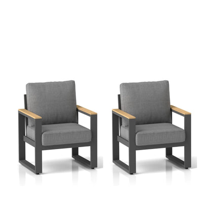 Dark gray patio armchairs with thick cushions, wood armrests, and dark frames (set of 2)