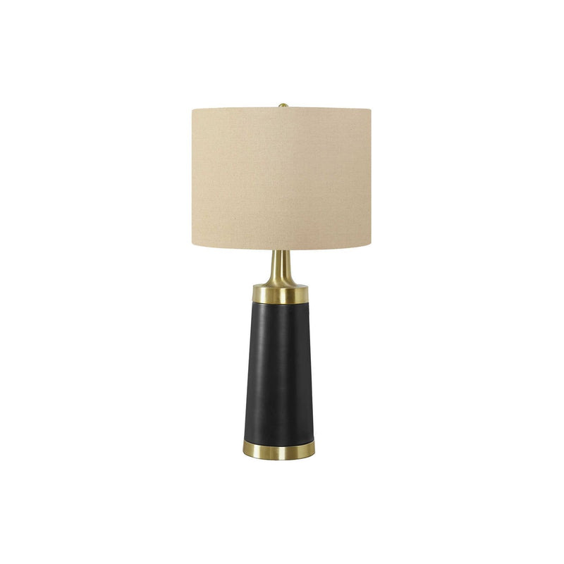Contemporary resin table lamp with cream fabric shade and black body, brushed gold accents