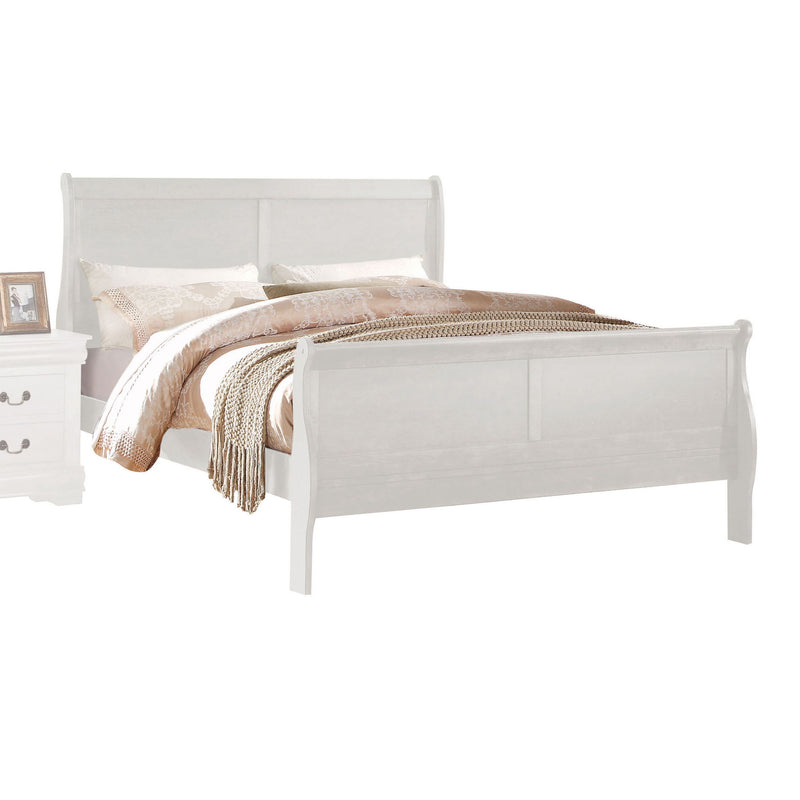 White sleigh bed with pillows and layered blanket on frame