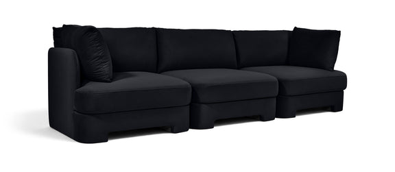 Black upholstered 3-piece velvet sofa with tufted seat and back cushions
