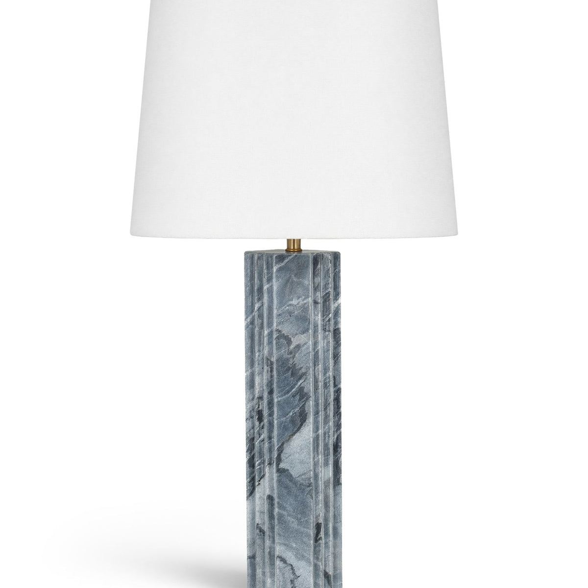 Table lamp with white fabric shade and blue-gray textured stone base