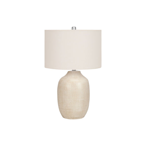 Cream ceramic table lamp with textured beige base and white fabric drum shade