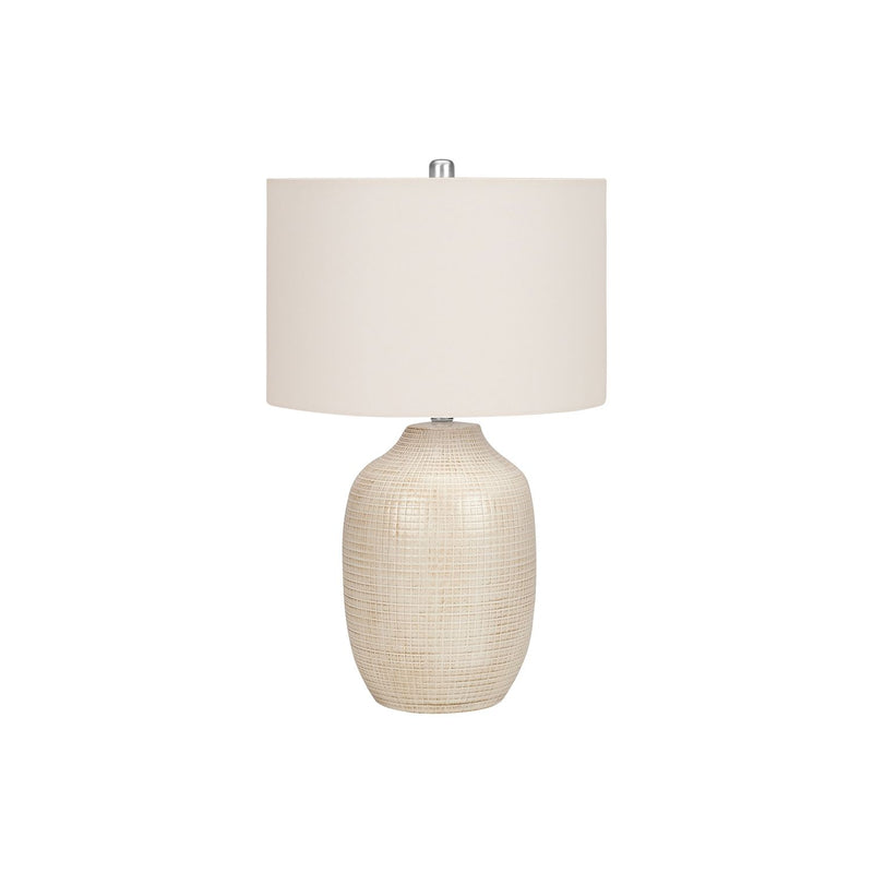 Cream ceramic table lamp with textured beige base and white fabric drum shade