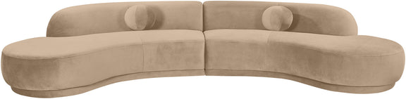 Beige velvet sectional sofa, low profile with rounded chaise and bolster cushions